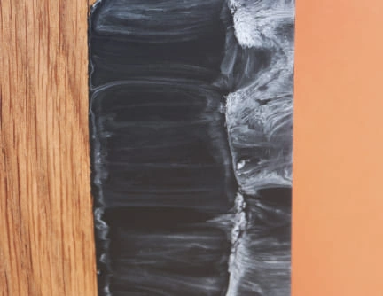 décapsuleur mural bois résine noir volutes